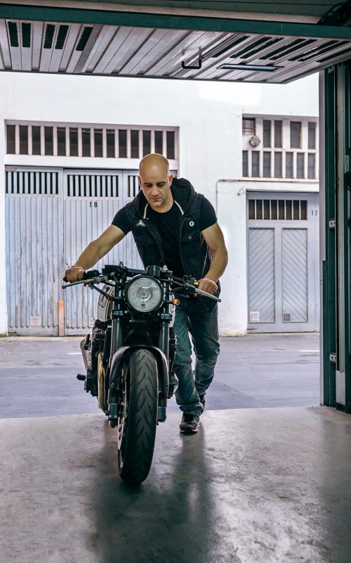 biker-taking-motorbike-to-the-garage-Z57S6QL-resize.jpg biker-taking-motorbike-to-the-garage-Z57S6QL-resize.jpg